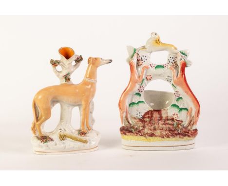 NINETEENTH CENTURY STAFFORDSHIRE FLAT BACK POTTERY GREYHOUND WATCH HOLDER GROUP, painted in colours and modelled with a leapi