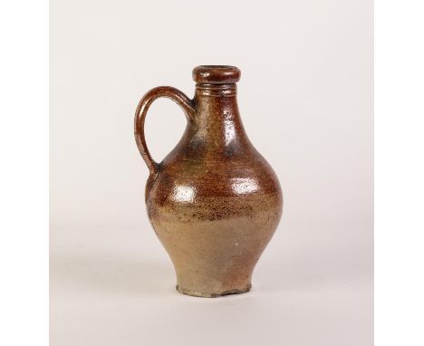 AN EIGHTEENTH CENTURY PROBABLY RHENISH SALT GLAZED STONEWARE JUG, the neck grooved for tying a cord to hold a stopper in plac