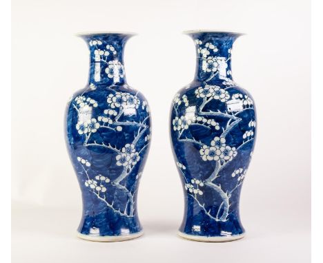 PAIR OF LATE NINETEENTH CENTURY CHINESE BLUE AND WHITE PORCELAIN VASES, each of baluster form with waisted neck, painted with