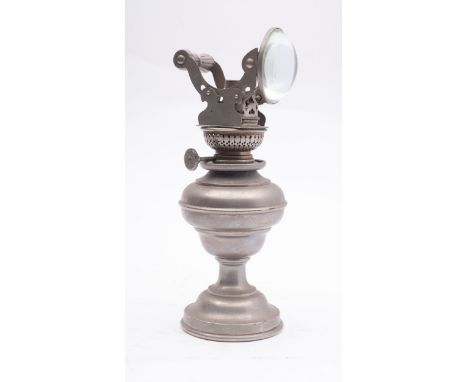 A late 19th/ early 20th century French microscope oil lamp illuminant, with adjustable bulls-eye lens, 25cm high