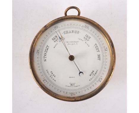A lacquered brass aneroid barometer, the dial with retailer's mark for ' T & H Doublet, Morgate St', 12.5cm diameter