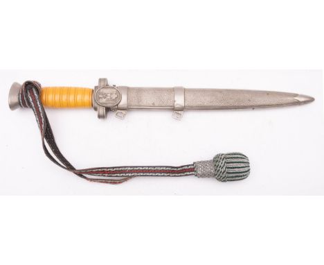 German Red Cross Leader dagger (DRK), double-edged dagger blade without maker. Oval guard with DRK eagle on one side, other s