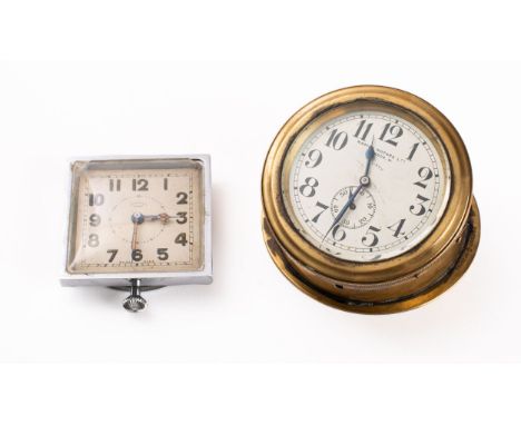 Napier Motors Limited , London , a brass cased dashboard clock, the eight day movement with silvered dial and Arabic numerals