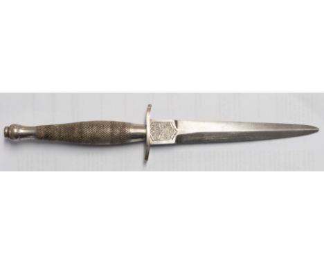 A WWII Fairbairn Sykes Fighting Knife, First Pattern, Type Two, maker Wilkinson Sword, London, the straight double edge blade