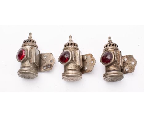 A group of three of Lucas No. 344 acetylene motorcycle rear lights, stamped as per title to top, with red lenses, and clear r