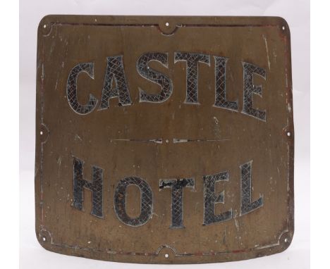 An early 20th century brass and enamel 'Castle Hotel' sign, the bow front sigh with remains of black enamel to text and red e