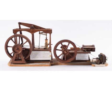 A 20th century scratch built wooden model of a James Watt Beam Engine and mill engine, the beam engine with 7 inch spoked fly