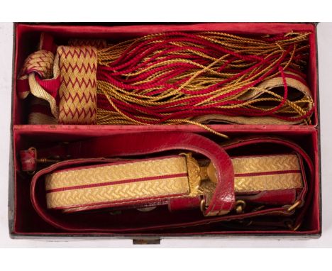 A Victorian Officer's red leather and gilt embroidered sword belt, maker Ranken & Co, Calcutta, together with matching sash i