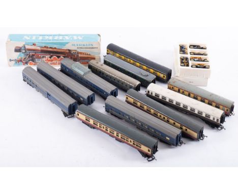 A boxed Marklin OO/HO gauge 'Schnellzoglokomotive',  4-6-2 DB black No. 01097 with matching tender in card box, together with