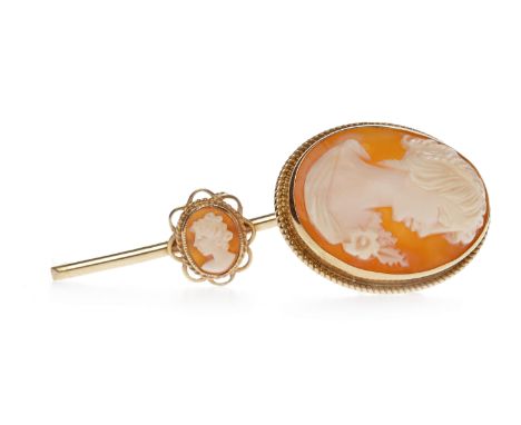 SIX NINE CARAT GOLD BROOCHESincluding a Victorian red gem and pearl example, 45mm long, 24.2g gross; along with a Victorian s