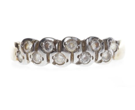 FOURTEEN CARAT GOLD GEM SET RINGset with round white gems, size R, 2.4g