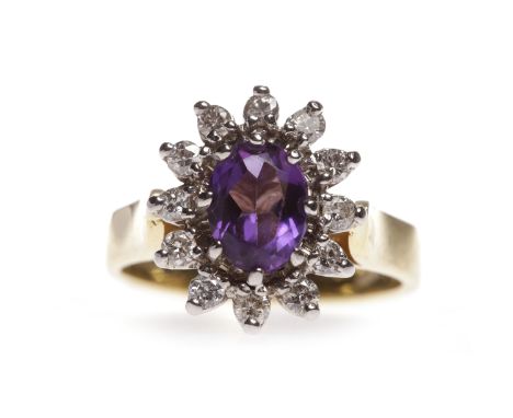 EIGHTEEN CARAT GOLD AMETHYST AND DIAMOND RINGthe oval amethyst 7.5mm long, surrounded by round brilliant cut diamonds totalli