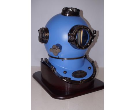 Blue divers helmet on base 