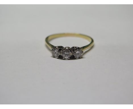 A yellow gold three stone diamond ring, each of approx 0.12cts - Size S 1/2 - weight approx 2.4 grams - tested to 18ct gold -