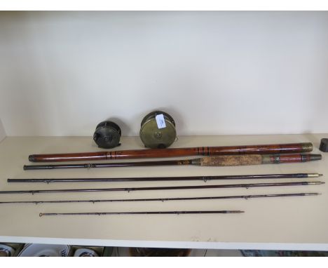 Two Army and Navy brass fishing reels - 4" and 3" and a C Farrow three piece Greenheart rod with 3 spare tips in a bamboo hol