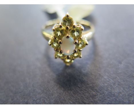 A 9ct yellow gold opal and peridot cluster ring - size N - approx 3 grams - In good condition 