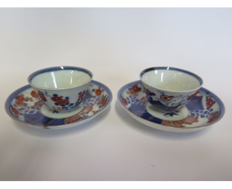 A pair of 18th Century Imari tea bowls and saucers in good condition, no obvious repairs with minor firing faults - saucers 1