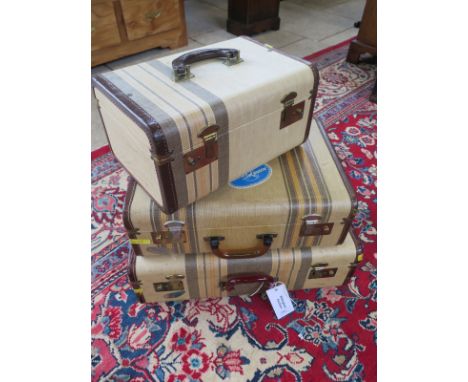 A set of three Vintage American suitcases by Durabilt Luggage Seattle, all with some usage but generally sound ans usable 