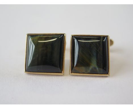 A pair of hallmarked 9ct yellow gold cufflinks, possibly labradorite 15mm x 15mm, total weight approx 11 grams in good condit