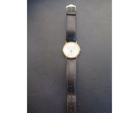 A Tissot Quartz wrist watch with multi dial including moonphase calendar and date - 34mm wide including button - number C295 
