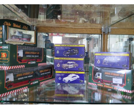 A collection of four Corgi diecast Eddie Stobbart lorries and four 1.43 scale best of British police cars - all boxed 