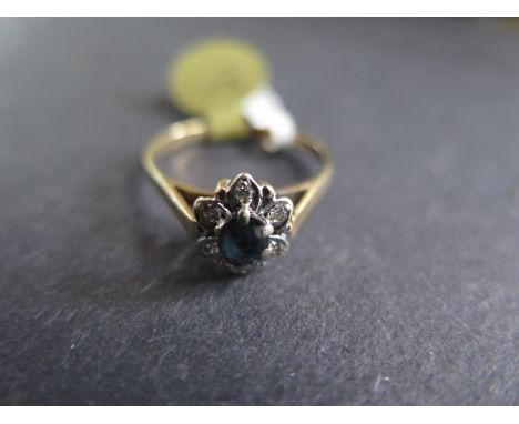 A 9ct yellow gold sapphire and diamond cluster ring - Size O - approx 2.1 grams - light scratches and usage wear otherwise go