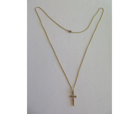 An Egyptian 18ct gold cross together with an 18ct gold neck chain - chain length - total approx weight 9.2 grams - good order