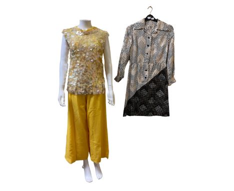 A 1970s silk shirt waist dress by Bill Blass and a 1960s canary yellow jumpsuit with a matching roll neck tunic blouse covere