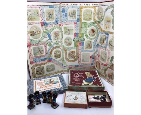 An Antique Board and boxed lead original playing pieces of the Peter rabbit Race game, with a folded strong 3 fold board and 