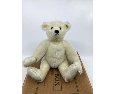 Vintage white mohair teddy bear with flat button in ear , with leather paws and black stitched nose, smile and claws-gold but