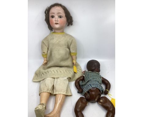 Antique doll Schoennau and Hoffmeister German bisque head doll 1909 mold composition and wooden body and limbs 24&rdquo; tall