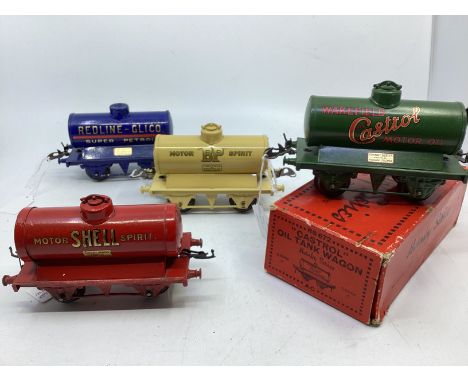 Hornby O gauge Fine collection ; 4 tanks to include a Castro Tank boxed wagon Green,a red shell wagon and a redline Glico blu