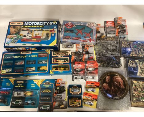 Large selection of Toys. To include old shop stock boxed matchbox car sets and Lord of the rings battle games sealed sets and