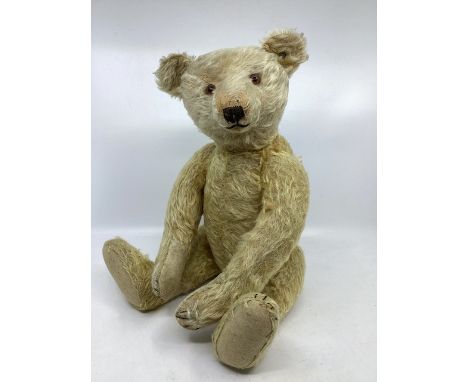 Steiff Antique Teddy bear First quarter 20th 18&rdquo; Light golden Mohair teddy bear with amber inset eyes and very dark bro