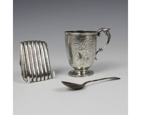 A Victorian silver christening mug, possibly Henry Wilkinson &amp; Co, London 1868, with all over floral engraved decoration 