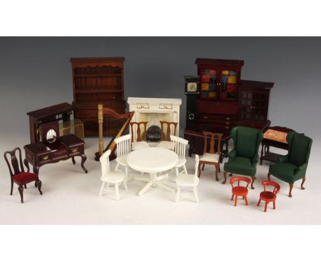 A large selection of dolls house furniture, including drawing room furniture, Kitchen furniture, pianos, seating, carpets, fi