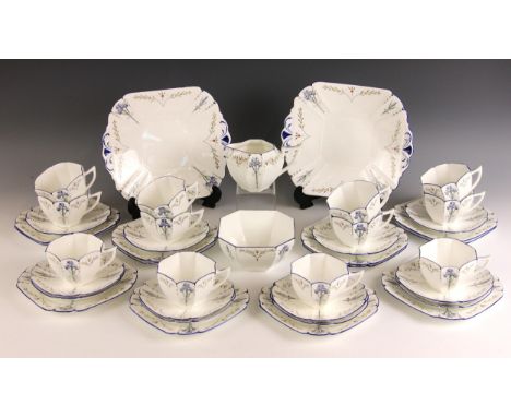 A Shelley Queen Anne part tea service in the 'Blue Iris' pattern, early 20th century circa 1930, comprising: twelve teacups, 