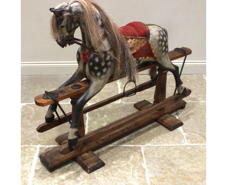 A late 19th/early 20th century dapple grey rocking horse, the iron brackets stamped 'H &amp; H', Hill and Harrison of Liverpo