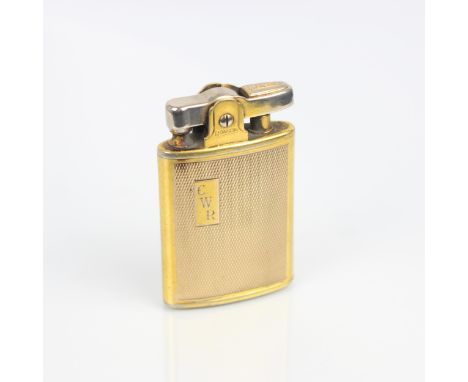 A 9ct gold stamped Ronson lighter, of typical form with gilt decoration and engraved 'CWR' initial, numbered '621570' to base