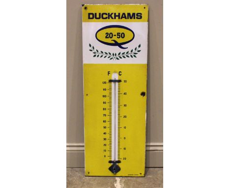 A mid 20th century enamelled advertising sign, 'Duckhams 20-50' with central thermometer, by Burnham, London, 91cm x 33cm