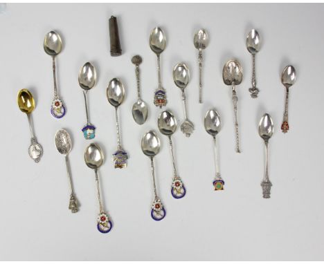 A selection of white metal and silver tourist spoons, including a set of three 'Sutton Coldfield Golf Club' silver enamel tea