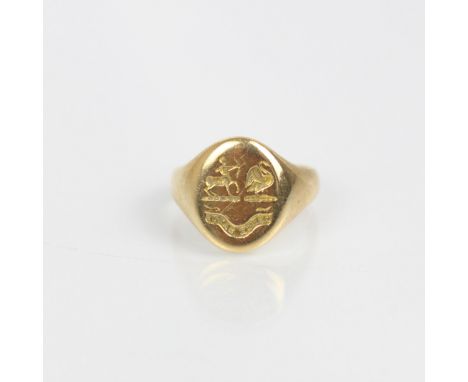 An early 20th century yellow metal signet ring, the oval head with intaglio seal depicting centaur and winged bird, above let