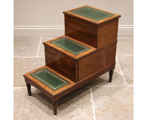 A set of Victorian mahogany library steps, applied with gilt tooled leather treads, the hinged and sliding second step openin