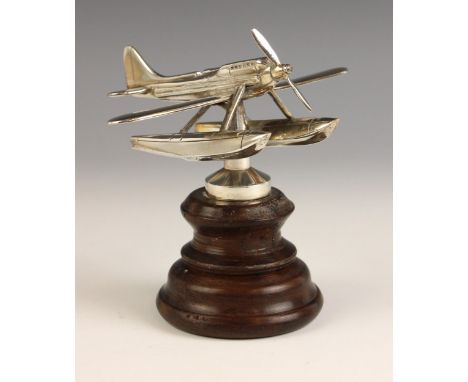 A Rolls-Royce car mascot modelled as a Supermarine S6B seaplane, made to commemorate victory in the 1929 Schneider Trophy air