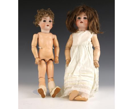 Kämmer &amp; Reinhardt, Simon &amp; Halbig, a bisque headed doll, rolling blue eyes, open mouth revealing upper teeth, compos