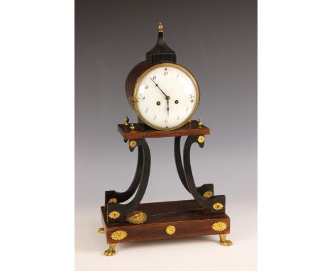 A 19th century mahogany and ebonised Austrian Biedermeier portico clock, the 11cm enamelled drum dial with a two train moveme
