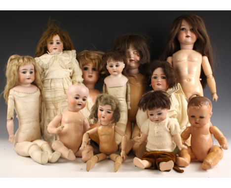 Twelve German bisque headed dolls, 19th/20th century, various makers and sizes, including an example by G.M.Bergmann Waltersh