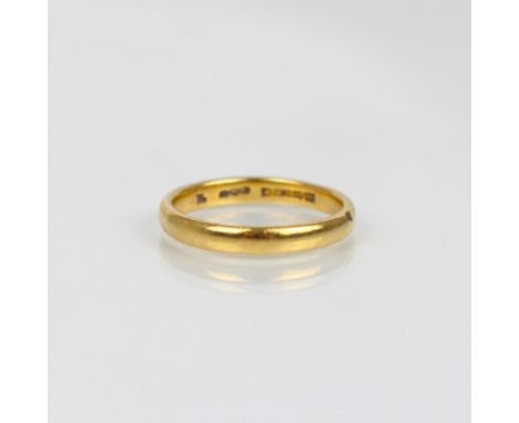 A 22ct yellow gold wedding band, stamped Birmingham 1962, ring size O 1/2, 4.3gms