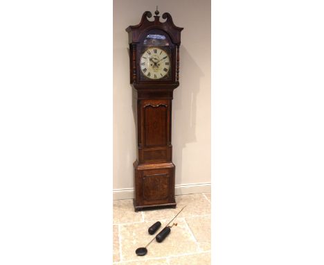 A George III oak and mahogany cased longcase clock, signed William Wain, Burslem, the twin swan neck hood with turned freesta