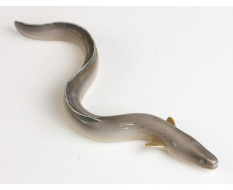 A Bing & Grondahl model of an eel, number 2138, printed and painted maker's marks, 16cm long CONDITION REPORT:The piece shows